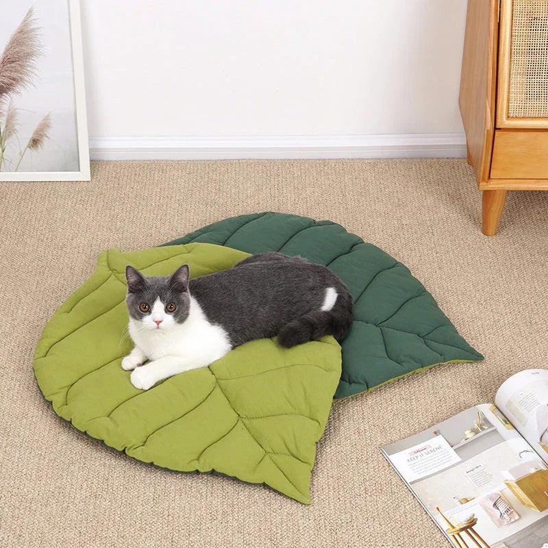 NNEDSZ 1 Pcs Green Leaf-Shaped Pet Sleeping Mat - Durable Dog Floor Pad & Cat Bed for Sleeping and Playtime.