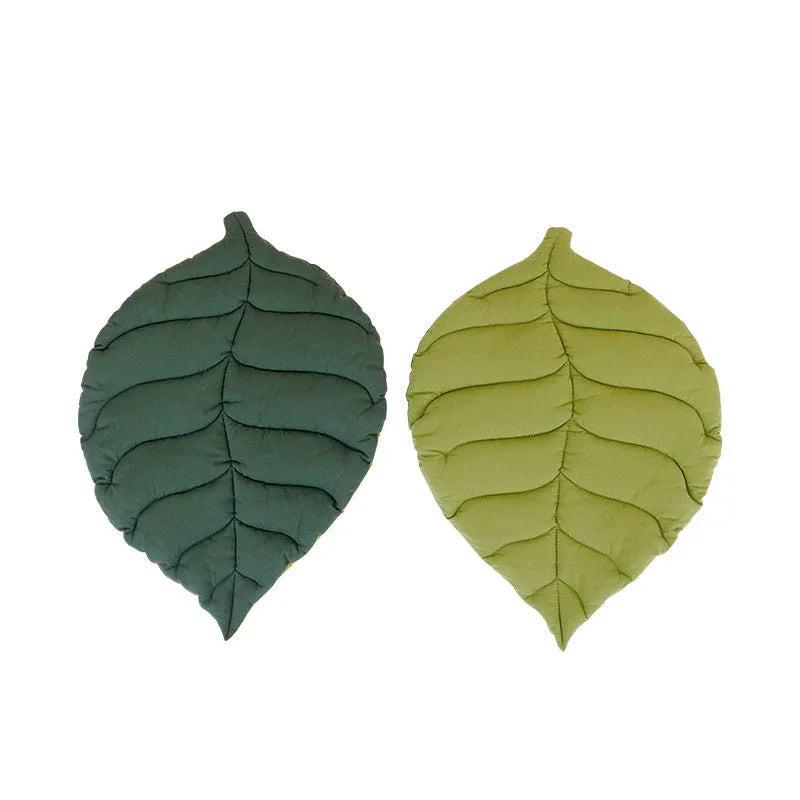 NNEDSZ 1 Pcs Green Leaf-Shaped Pet Sleeping Mat - Durable Dog Floor Pad & Cat Bed for Sleeping and Playtime.